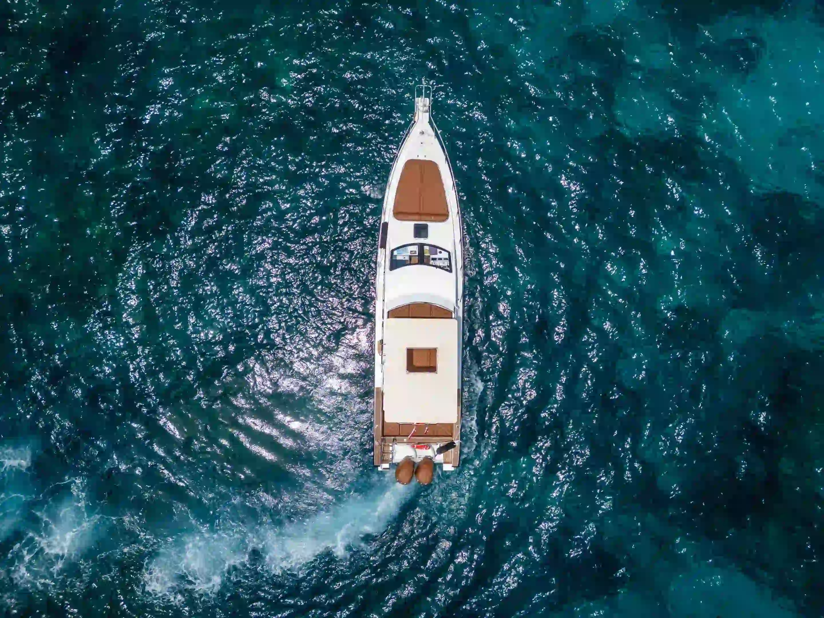 A charter yacht alongside at the marina