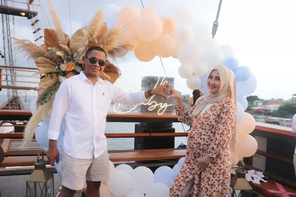 A birthday celebration set up on a charter boat deck