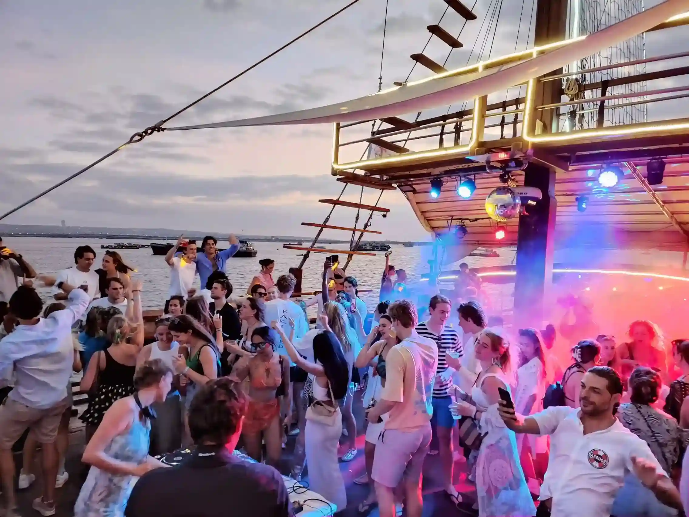 A group gathered on a charter boat deck