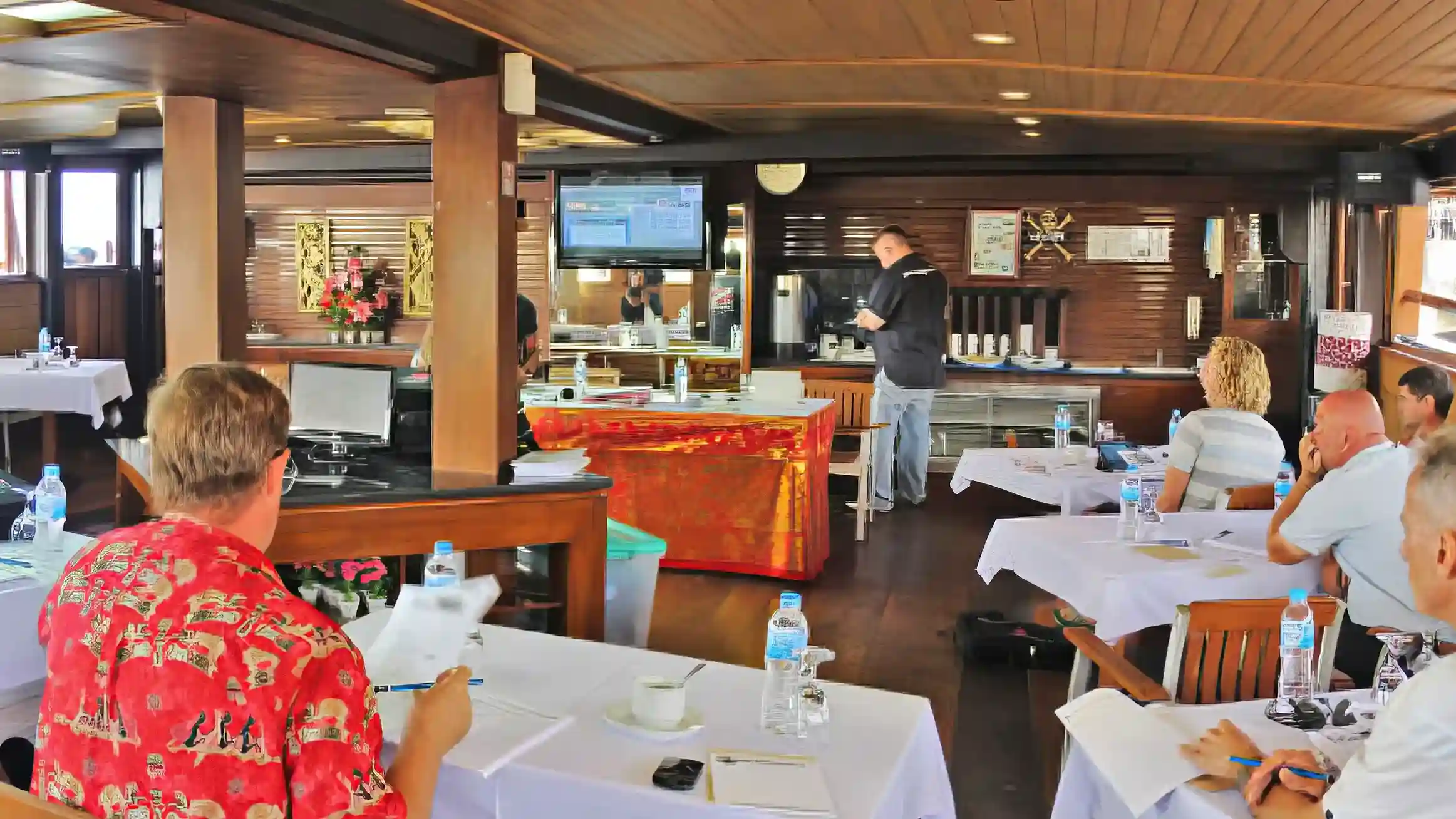 A meeting area set up on board a charter vessel