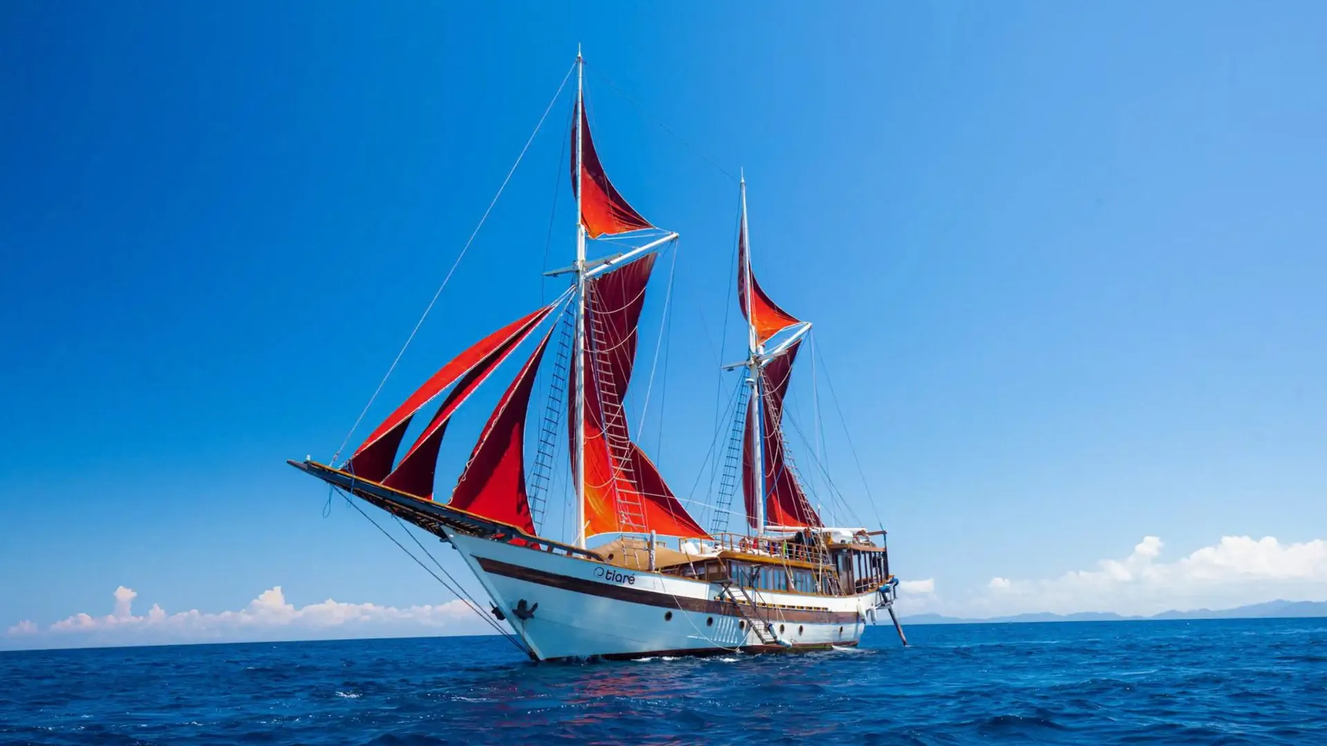 A phinisi liveaboard at anchor